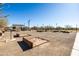 Community lawn games area with sand volleyball and horseshoes at 12179 E Sereno Rd, Gold Canyon, AZ 85118