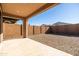 Covered patio overlooking a gravel backyard at 12179 E Sereno Rd, Gold Canyon, AZ 85118