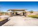 Community picnic area with covered pavilion and grills at 12179 E Sereno Rd, Gold Canyon, AZ 85118