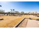 Community playground with play structures and swings at 12179 E Sereno Rd, Gold Canyon, AZ 85118