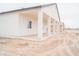 New construction home with covered patio and desert landscaping at 15820 S Animas Rd, Arizona City, AZ 85123