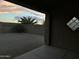 Low-maintenance backyard with gravel landscaping and block wall fencing at 45737 W Ranch Rd, Maricopa, AZ 85139
