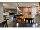 Open kitchen floor plan with bar seating leading to the living room at 45737 W Ranch Rd, Maricopa, AZ 85139