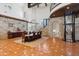 Dining area showcases an elaborate stairway, custom light fixture, and elevator access at 21868 E Stacey Rd, Queen Creek, AZ 85142