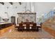 Spacious dining area with stone accent walls and custom lighting at 21868 E Stacey Rd, Queen Creek, AZ 85142