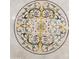 Intricate marble medallion floor design with botanical accents in green, brown, and yellow tones at 21868 E Stacey Rd, Queen Creek, AZ 85142