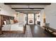 Cozy main bedroom with fireplace and dark hardwood floors at 21868 E Stacey Rd, Queen Creek, AZ 85142