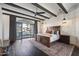 Serene main bedroom with access to a private balcony and pool views at 21868 E Stacey Rd, Queen Creek, AZ 85142