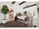 Main bedroom featuring beamed ceilings and private sitting area at 21868 E Stacey Rd, Queen Creek, AZ 85142