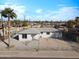 Aerial view of charming home, featuring a spacious driveway and mature landscaping at 4333 N 59 Th Ave, Phoenix, AZ 85033