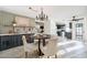 Elegant dining area with a charming chandelier and built-in cabinetry at 7 W Sarah Ln, Tempe, AZ 85284