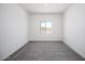 Bedroom with neutral carpet, and bright natural light at 24594 W St Catherine Ave, Buckeye, AZ 85326