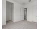 An interior shot of a bedroom with soft gray carpet and bright white trim and doors at 19539 E Estrella Rd, Queen Creek, AZ 85142