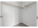 An empty, walk-in closet with gray carpet and shelving at 19539 E Estrella Rd, Queen Creek, AZ 85142