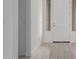 Close up view of the front door with sidelight window and tile flooring at 19539 E Estrella Rd, Queen Creek, AZ 85142