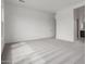 Bright main bedroom with plush carpet and access to the bathroom at 19539 E Estrella Rd, Queen Creek, AZ 85142