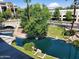 Scenic view of the lush water feature and landscaping from an upper level of the condos at 2989 N 44Th St # 3036, Phoenix, AZ 85018