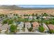 Scenic aerial view showcasing homes, landscaping, and mountain views, highlighting the community's appeal at 2920 E Shady Spring Trl, Phoenix, AZ 85024