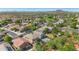 Community aerial view with diverse homes, mature trees, pool, and amenities for comfortable living at 2920 E Shady Spring Trl, Phoenix, AZ 85024