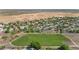 Overhead shot of neighborhood homes with solar, desert landscape, and open land for future development at 2920 E Shady Spring Trl, Phoenix, AZ 85024