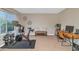 Versatile room features a desk area, workout equipment and natural light, ideal for a home office or gym at 2920 E Shady Spring Trl, Phoenix, AZ 85024
