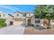 Charming two-story home features a two car garage, desert landscaping, and an inviting entrance at 2920 E Shady Spring Trl, Phoenix, AZ 85024