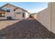 Backyard with gravel and block wall at 5730 E Holmes Ave, Mesa, AZ 85206