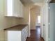 White cabinets and granite countertop in hallway at 5730 E Holmes Ave, Mesa, AZ 85206