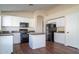 Bright kitchen, granite countertops, and white cabinets at 5730 E Holmes Ave, Mesa, AZ 85206