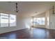 Living room with hardwood floors and large windows at 5730 E Holmes Ave, Mesa, AZ 85206