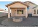 Patio with fire pit and access to backyard at 5730 E Holmes Ave, Mesa, AZ 85206