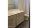 Bathroom with a modern vanity, sink, and marble floors at 19031 W Palo Verde Dr, Litchfield Park, AZ 85340