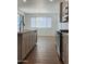 Modern kitchen featuring stainless steel appliances and light countertops at 19031 W Palo Verde Dr, Litchfield Park, AZ 85340