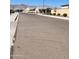 A street with houses and desert mountain views at 19031 W Palo Verde Dr, Litchfield Park, AZ 85340
