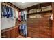 Large closet with custom built-ins and shelving at 40167 N 110Th Pl, Scottsdale, AZ 85262