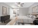 Relaxing bedroom with neutral paint, carpet, and modern decor with easy access to the ensuite bathroom at 9275 E Mission Ln # 215, Scottsdale, AZ 85258