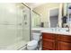 Clean bathroom with walk-in shower, toilet, and vanity at 3799 S Skyline Dr, Gilbert, AZ 85297