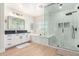 Elegant bathroom with soaking tub, walk-in shower, and modern fixtures at 3799 S Skyline Dr, Gilbert, AZ 85297