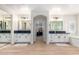 Elegant bathroom with double sinks, soaking tub, and separate shower at 3799 S Skyline Dr, Gilbert, AZ 85297