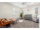 Bright Bedroom with crib, seating, and natural light at 3799 S Skyline Dr, Gilbert, AZ 85297