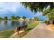 Peaceful lakefront community with walking paths and benches at 3799 S Skyline Dr, Gilbert, AZ 85297