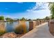 Beautiful community lake with a walking path and landscaping at 3799 S Skyline Dr, Gilbert, AZ 85297