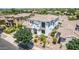 Two-story house with white exterior, landscaping, and driveway at 3799 S Skyline Dr, Gilbert, AZ 85297