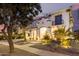 Two-story home with evening lighting at 3799 S Skyline Dr, Gilbert, AZ 85297