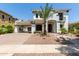 Two story home with palm trees at 3799 S Skyline Dr, Gilbert, AZ 85297