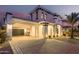 Stunning two-story home with a three-car garage and landscaped front yard at 3799 S Skyline Dr, Gilbert, AZ 85297