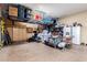 Garage with overhead storage and shelving at 3799 S Skyline Dr, Gilbert, AZ 85297