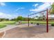 Playground with swings set in grassy area at 3799 S Skyline Dr, Gilbert, AZ 85297