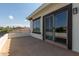 Spacious rooftop deck with sliding glass door and city views at 3799 S Skyline Dr, Gilbert, AZ 85297