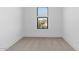 Bedroom showcasing a cozy interior with carpet flooring and natural light from the window at 4353 N 203Rd Ave, Buckeye, AZ 85396